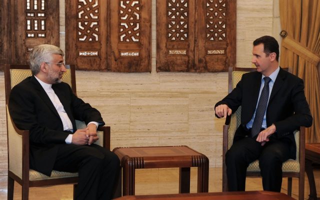 Saeed Jalili, left, meeting with Bashar Assad in Damascus on Sunday. (photo credit: AP/SANA) Saeed Jalili, left, meeting with Bashar Assad in Damascus on Sunday. (photo credit: AP/SANA)
