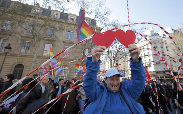 Illustrative -- Pro gay marriage activists reacts after French lawmakers legalized same-sex marriage, April 23, 2013 in Paris (AP Photo/Francois Mori) Illustrative -- Pro gay marriage activists reacts after French lawmakers legalized same-sex marriage, April 23, 2013 in Paris (AP Photo/Francois Mori)