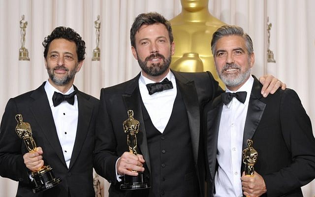Ben Affleck (center) with Grant Heslov (left) and George Clooney pose with their awards for best picture for "Argo" during the Oscars at the Dolby Theater in Los Angeles on February 24, 2013. (photo credit: John Shearer/Invision/AP) Ben Affleck (center) with Grant Heslov (left) and George Clooney pose with their awards for best picture for "Argo" during the Oscars at the Dolby Theater in Los Angeles on February 24, 2013. (photo credit: John Shearer/Invision/AP)