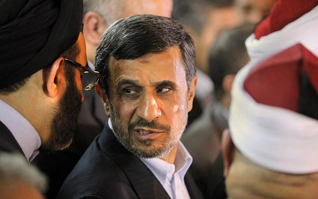 Iranian President Mahmoud Ahmadinejad, center, attends a press conference with Egyptian Sunni clerics at Al-Azhar headquarters in Cairo, Egypt, Tuesday, Feb. 5, 2013. (photo credit: AP/Amr Nabil)