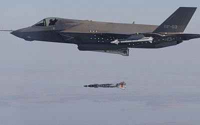 A F-35 bomber variant releasing a 500-pound bomb during a weapons test, in December 2012. (photo credit: US Navy/Lockheed Martin)