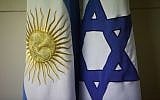 An Argentine and Israeli flag stand side by side at the office of Guillermo Borger, president of the Jewish community center AMIA, Argentina. (AP Photo/Victor R. Caivano)