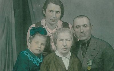 Morris Greenberg's brother poses with his wife, daughter and granddaughter. Sofia Greenberg hopes her American cousins will recognize them. (Courtesy of Sofia Greenberg via JTA)