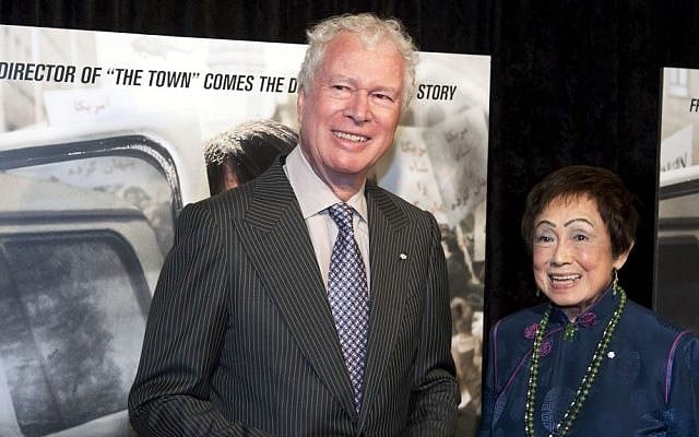 Former Canadian Ambassador Ken Taylor and his wife, Pat, pose for photographers at the premiere of the film Argo in Washington, DC, last October (photo credit: AP/Cliff Owen)
