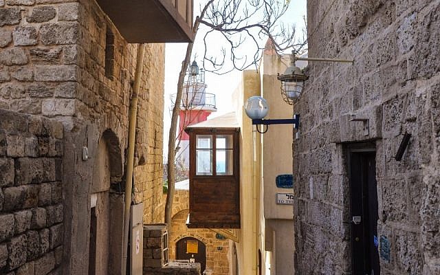 A view of the house of Simon the Tanner (door at the bottom) and the lighthouse above it (photo credit: Michal Shmulovich/Times of Israel)