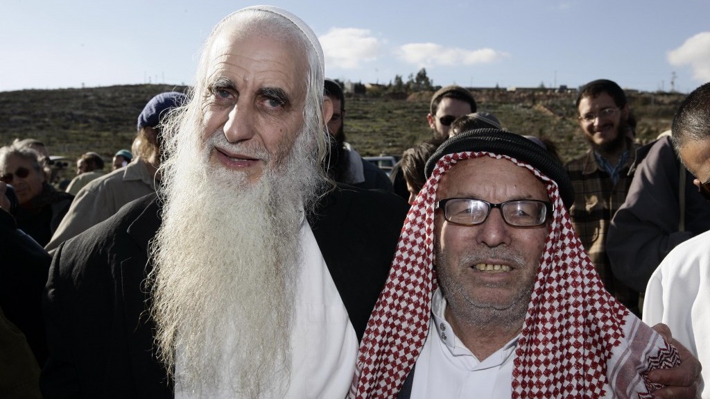 Froman (left), at a roadblock outside the West Bank village of Yasuf, near Nablus, in 2009 (Photo credit: Abir Sultan/Flash90)