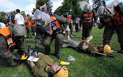 A defense drill simulating a missile attack, at a Holon school in 2011. (photo credit: Gili Yaari/Flash90)