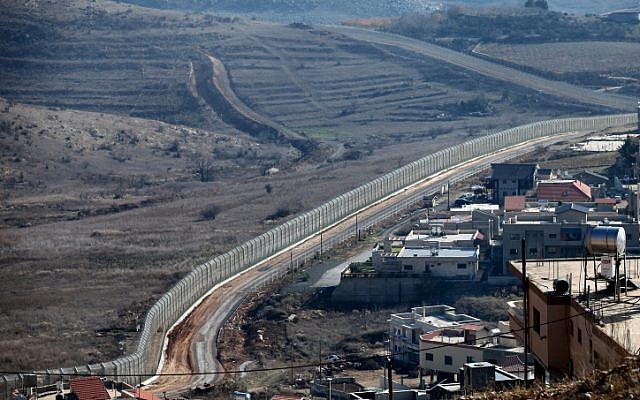 The new border fence as seen from the Druze village of Majdal Shams (Photo credit: Moshe Shai/ Flash 90)