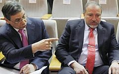 Former deputy foreign minister Danny Ayalon (left) with ex-foreign minister Avigdor Liberman in the Knesset in 2012 (Photo credit: Miriam Alster/FLASH90)