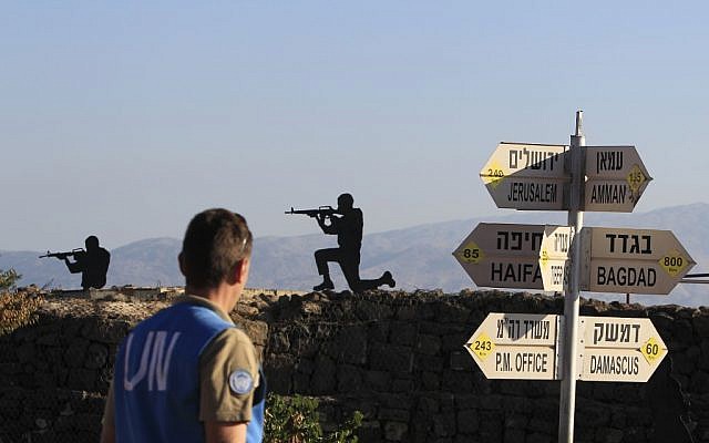 A UN peacekeeper near the Israel-Syria border (photo credit: Tsafrir Abayov/Flash90)