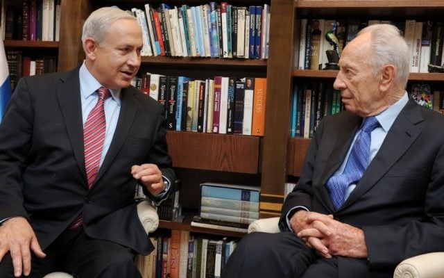 Prime Minister Benjamin Netanyahu with then-president Shimon Peres on October 10, 2012 (Moshe Milner/GPO/FLASH90)