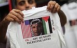 A vendor displays T-shirts for US President Barack Obama at his souvenir shop in Gaza City (photo credit: Wissam Nassar/Flash90)