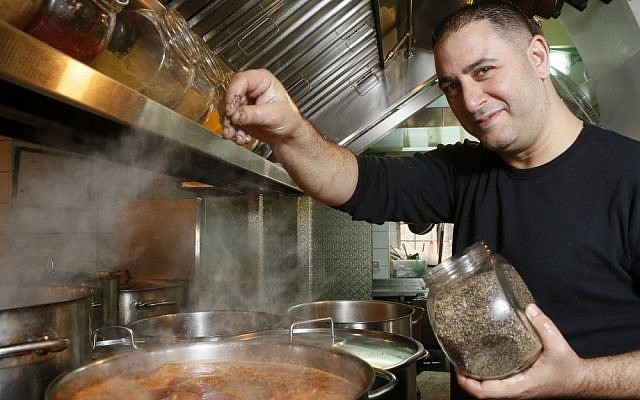 Avi Levy in his HaMotzi kitchen (photo credit: Miriam Alster/Flash90)
