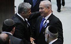 Prime Minister Benjamin Netanyahu with Yesh Atid leader, Yair Lapid, at the opening session of the Knesset, February 5, 2013 (photo credit: Miriam Alster/Flash90)