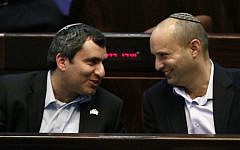Jewish Home party leader Naftali Bennett (right) sits in Knesset with Likud's Zeev Elkin, Monday, February 11, 2013 (photo credit: Miriam Alster/Flash90)