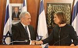 Prime Minister Benjamin Netanyahu and Hatnua party leader Tzipi Livni at the joint press conference where Livni announced she was joining Netanyahu's government as minister of justice, February 19, 2013. (Photo credit: Miriam Alster/FLASH90)