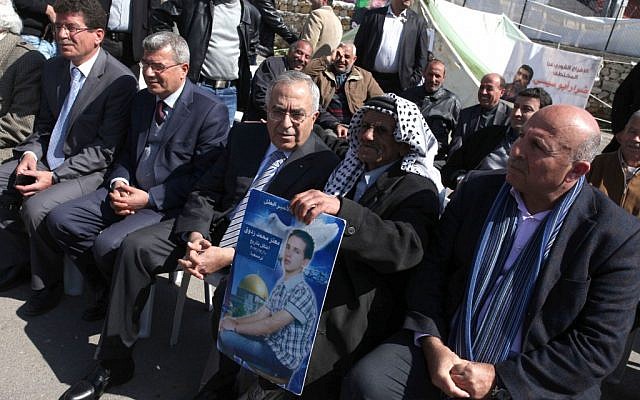 Former Palestinian prime minister Salam Fayyad participates in a sit-in tent in support of Palestinian prisoners on hunger strike in Israeli prisons, in the West Bank city of Ramallah on February 20, 2013 (photo credit: Issam Rimawi/Flash90) Former Palestinian prime minister Salam Fayyad participates in a sit-in tent in support of Palestinian prisoners on hunger strike in Israeli prisons, in the West Bank city of Ramallah on February 20, 2013 (photo credit: Issam Rimawi/Flash90)