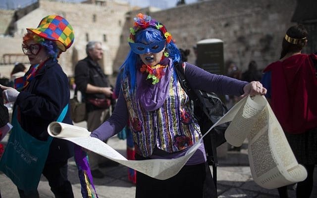 Members of the activist group Women of the Wall celebrate the holiday of Purim with a reading of the Scroll of Esther at the Western Wall, Judaism's holiest site, in Jerusalem on February 23, 2013. (photo credit: Yonatan Sindel/Flash90)