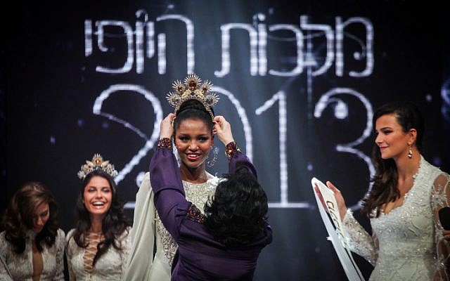 Yityish Aynaw, who immigrated to Israel at age 12 from Ethiopia, is crowned Israel's beauty queen on Wednesday, Feb. 27 (photo credit: Avishag Shar Yashuv/Flash90) Yityish Aynaw, who immigrated to Israel at age 12 from Ethiopia, is crowned Israel's beauty queen on Wednesday, Feb. 27 (photo credit: Avishag Shar Yashuv/Flash90)