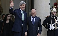 US Secretary of State John Kerry, left, is accompanied by France's President Francois Hollande after their meeting at the Elysee Palace, in Paris, on Wednesday, February 27, 2013. (photo credit: AP Photo/Francois Mori)