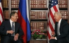 US Vice President Joe Biden, right, laughs as he talks to Sergey Lavrov, Foreign Minister of Russia, during the International Security Conference in Munich on Saturday. (AP Photo/Matthias Schrader)
