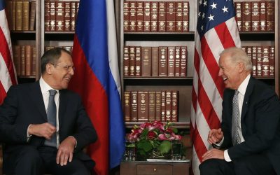US Vice President Joe Biden, right, laughs as he talks to Sergey Lavrov, Foreign Minister of Russia, during the International Security Conference in Munich on Saturday. (AP Photo/Matthias Schrader)