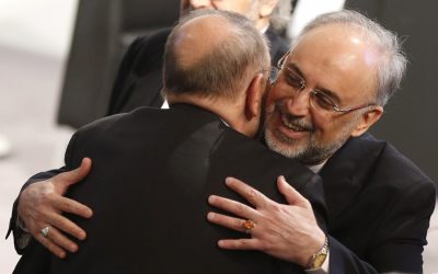 Iranian Foreign Minister Ali Akbar Salehi, right, hugs former NATO Secretary General Javier Solana as he arrives for the Security Conference in Munich, Germany, on Sunday, Feb. 3, 2013. (photo credit: AP/Matthias Schrader) Iranian Foreign Minister Ali Akbar Salehi, right, hugs former NATO Secretary General Javier Solana as he arrives for the Security Conference in Munich, Germany, on Sunday, Feb. 3, 2013. (photo credit: AP/Matthias Schrader)