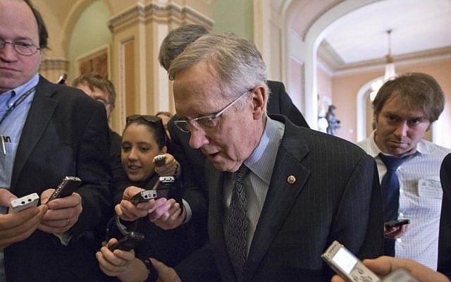 Senate Majority Leader Harry Reid of Nevada makes his way to the Senate floor on Capitol Hill in Washington after a Democratic caucus meeting earlier this month. (photo credit: AP/J. Scott Applewhite) Senate Majority Leader Harry Reid of Nevada makes his way to the Senate floor on Capitol Hill in Washington after a Democratic caucus meeting earlier this month. (photo credit: AP/J. Scott Applewhite)