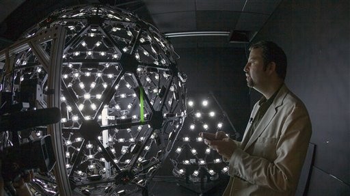 Paul Debevec, the associate director for graphics research at the University of Southern California's Institute for Creative Technologies, explains the Lighting Stage X, an LED-filled sphere used to help create realistic virtual characters, in Los Angeles on Tuesday (photo credit: AP/Damian Dovarganes) Paul Debevec, the associate director for graphics research at the University of Southern California's Institute for Creative Technologies, explains the Lighting Stage X, an LED-filled sphere used to help create realistic virtual characters, in Los Angeles on Tuesday (photo credit: AP/Damian Dovarganes)