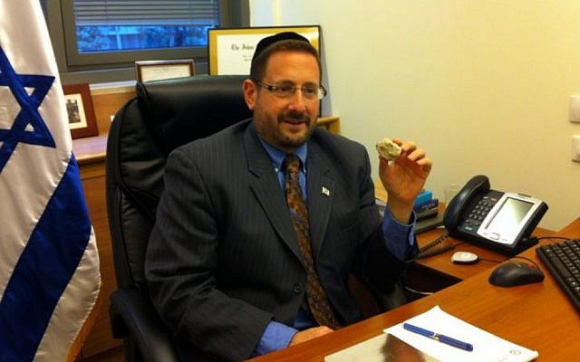 The rabbi and the rock: Dov Lipman in his Knesset office (photo credit: Courtesy)