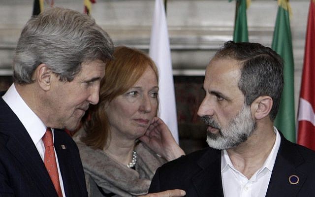 US Secretary of State John Kerry, left, talks to Syrian opposition coalition leader Mouaz al-Khatib, during an international conference on Syria at Villa Madama, Rome, Thursday, Feb. 28, 2013 (photo credit: AP/Riccardo De Luca) US Secretary of State John Kerry, left, talks to Syrian opposition coalition leader Mouaz al-Khatib, during an international conference on Syria at Villa Madama, Rome, Thursday, Feb. 28, 2013 (photo credit: AP/Riccardo De Luca)