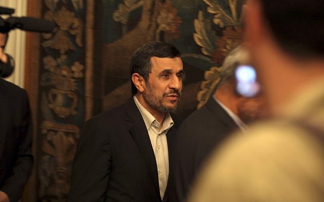 Iran's President Mahmoud Ahmadinejad, leaves a press conference in Cairo, Egypt, Thursday Feb. 7, 2013. (photo credit: AP/Khalil Hamra) Iran's President Mahmoud Ahmadinejad, leaves a press conference in Cairo, Egypt, Thursday Feb. 7, 2013. (photo credit: AP/Khalil Hamra)