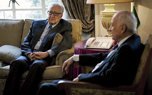 Arab League Secretary-General Nabil Elaraby, right, meets with U.N.-Arab League envoy to Syria Lakhdar Brahimi at the Arab League headquarters, in Cairo, Egypt, Sunday, Feb. 17, 2013. Brahimi, and Elaraby threw their weight behind the call for a dialogue to resolve the Syrian conflict made by Moaz al-Khatib, president of the opposition coalition (Photo credit: AP/Nasser Nasser).