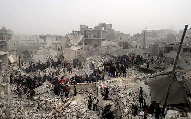 Syrian civilians searching through the debris of destroyed buildings in the aftermath of a strike by Syrian government forces, in the neighborhood of Jabal Bedro, Aleppo, Syria, Tuesday Feb. 19 (photo credit: AP/Aleppo Media Center) Syrian civilians searching through the debris of destroyed buildings in the aftermath of a strike by Syrian government forces, in the neighborhood of Jabal Bedro, Aleppo, Syria, Tuesday Feb. 19 (photo credit: AP/Aleppo Media Center)