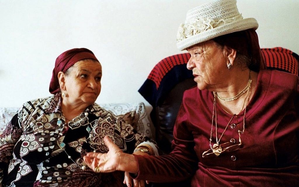 A still from 'Tinghir-Jerusalem: Echoes from the Mellah' shows Aicha Elkoubi, left, and Hannah Schmouyane, Moroccan Jews who immigrated to Israel, reminisce about the old days. (photo credit: AP Photo/Les Films d'un Jour) A still from 'Tinghir-Jerusalem: Echoes from the Mellah' shows Aicha Elkoubi, left, and Hannah Schmouyane, Moroccan Jews who immigrated to Israel, reminisce about the old days. (photo credit: AP Photo/Les Films d'un Jour)