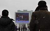On a large television screen in front of Pyongyang's railway station, a North Korean state television broadcaster announces the news that North Korea conducted a nuclear test on Tuesday, Feb. 12, 2013 (photo credit: AP/Jon Chol Jin)