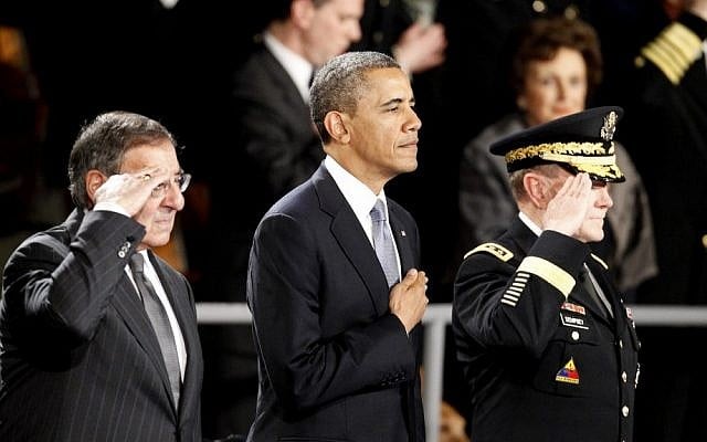 US President Barack Obama attends an Armed Forces Farewell Ceremony to honor outgoing Defense Secretary Leon Panetta, left, in February 2013, at Joint Base Myer-Henderson Hall in Arlington, Va. Joint Chiefs Chairman Army Gen. Martin Dempsey is at right. (photo credit: AP Photo/Ann Heisenfelt) US President Barack Obama attends an Armed Forces Farewell Ceremony to honor outgoing Defense Secretary Leon Panetta, left, in February 2013, at Joint Base Myer-Henderson Hall in Arlington, Va. Joint Chiefs Chairman Army Gen. Martin Dempsey is at right. (photo credit: AP Photo/Ann Heisenfelt)