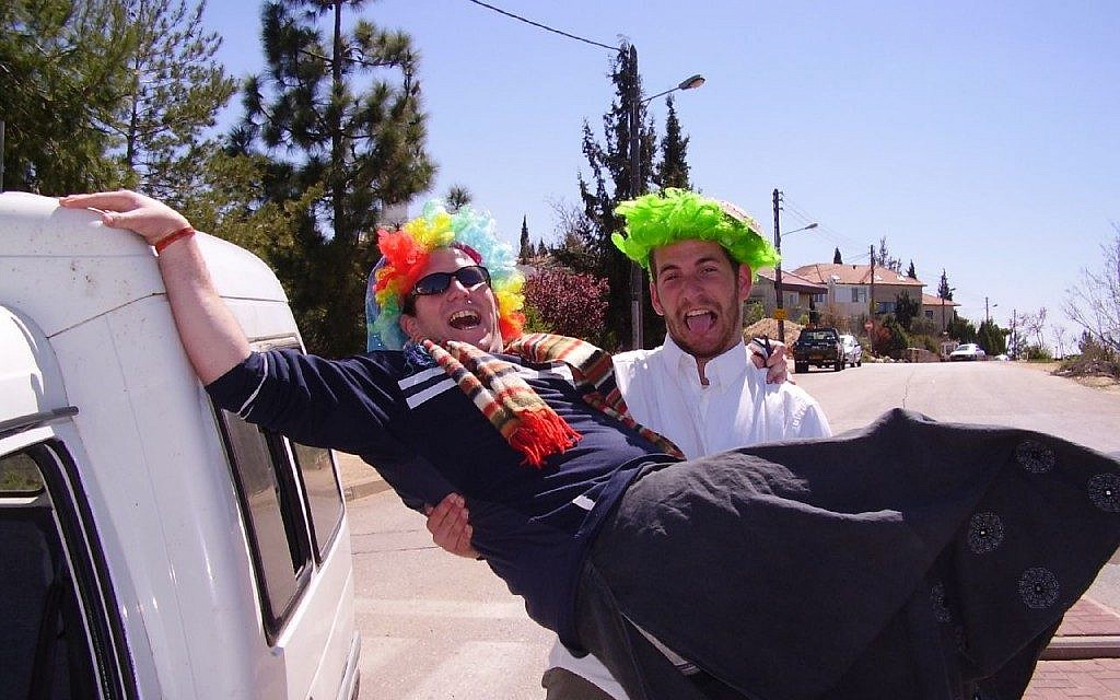 Purim offers some serious reasons for laughter. (Yoel Ben-Avraham/Creative Commons via JTA) Purim offers some serious reasons for laughter. (Yoel Ben-Avraham/Creative Commons via JTA)