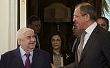 Russian Foreign Minister Sergey Lavrov (right), welcomes Syrian Foreign Minister Walid Moallem (left), in Moscow, February 25, 2013. (AP/Ivan Sekretarev)