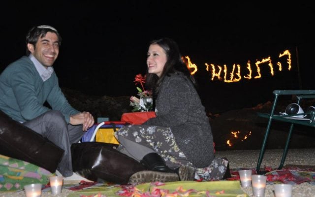 Sara Tushinski and Nir Shamir share a smile after their engagement at the Oranit checkpoint in western Samaria on Sunday evening (photo credit: Sara Tushinski's Facebook page).