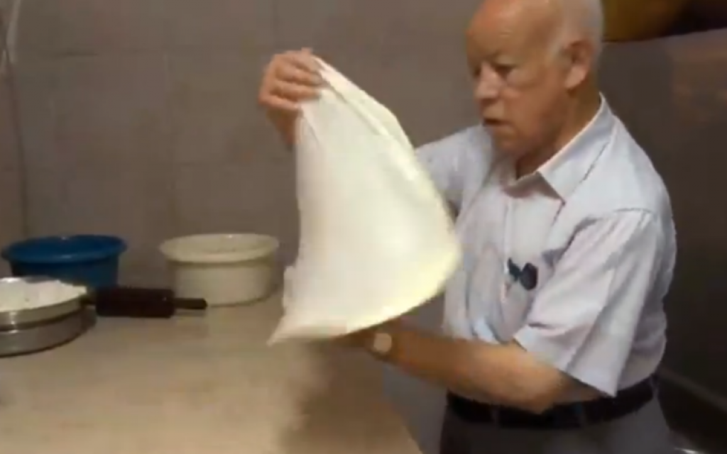 Mr Zalatimo (the elder) works his pastry magic (photo credit: YouTube screen shot) Mr Zalatimo (the elder) works his pastry magic (photo credit: YouTube screen shot)