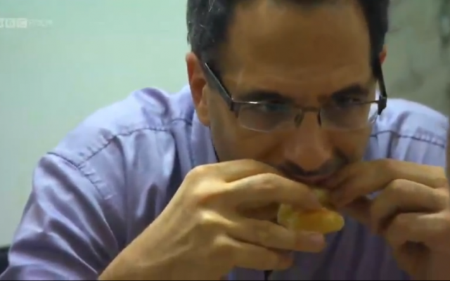 Wow! Yotam Ottolenghi tucks in (photo credit: YouTube screenshot)