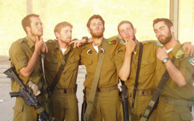 Seth Freedman, center, channeled disenchantment with Israel and his IDF service into a popular online column for Britain's Guardian newspaper. (Courtesy of Seth Freedman)