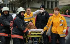 Medical workers carry away a woman injured when a suicide bomber detonated an explosive device at the entrance to the US Embassy in Ankara, Turkey, in early February (photo credit: AP/Burhan Ozbilici)