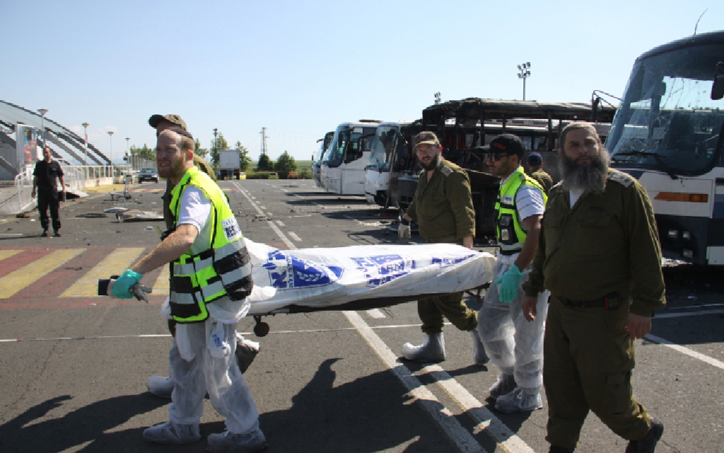 An Israeli emergency rescue team transports the body of a victim of July's terrorist attack in Bulgaria. (Dano Monkotovic/FLASH90/JTA) An Israeli emergency rescue team transports the body of a victim of July's terrorist attack in Bulgaria. (Dano Monkotovic/FLASH90/JTA)