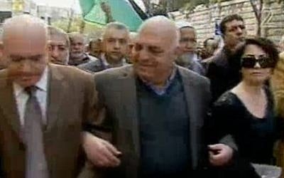 Israeli Arab MKs link hands at a protest in Nazareth, expressing solidarity for hunger-striking Palestinians in Israel. (screen capture: Channel 2)