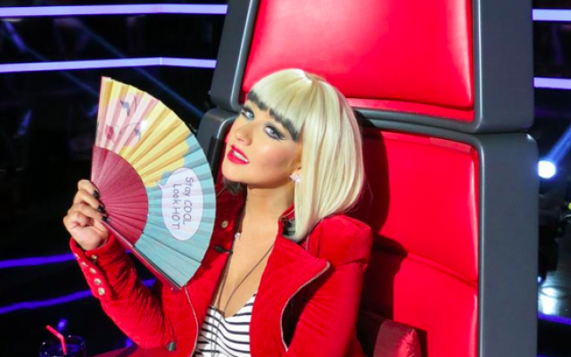 Christina Aguilera and her Israeli hand fan on 'The Voice' (Courtesy Christina Aguilera Facebook page) Christina Aguilera and her Israeli hand fan on 'The Voice' (Courtesy Christina Aguilera Facebook page)