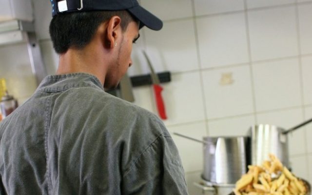 A youth works in Liliyot's kitchen (Photo credit: Ringelblum/Ilan Spira) A youth works in Liliyot's kitchen (Photo credit: Ringelblum/Ilan Spira)