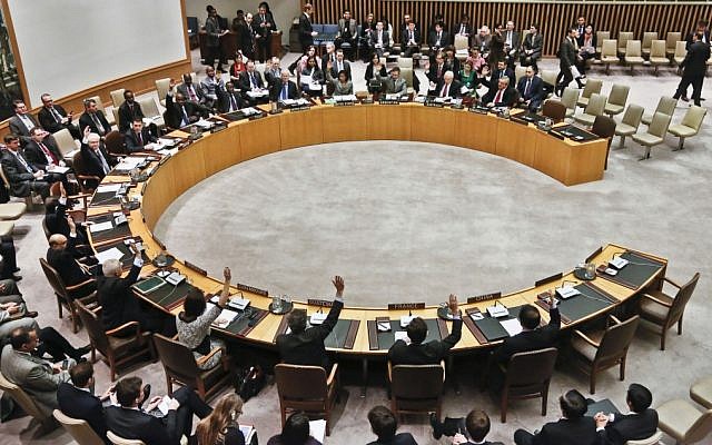 UN Security Council members vote during a March meeting  (photo credit: AP/Bebeto Matthews/File)
