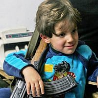 Weapons are part of everyday life. Qalaat al-Madik (photo: Eliyahu Kamisher) Weapons are part of everyday life. Qalaat al-Madik (photo: Eliyahu Kamisher)